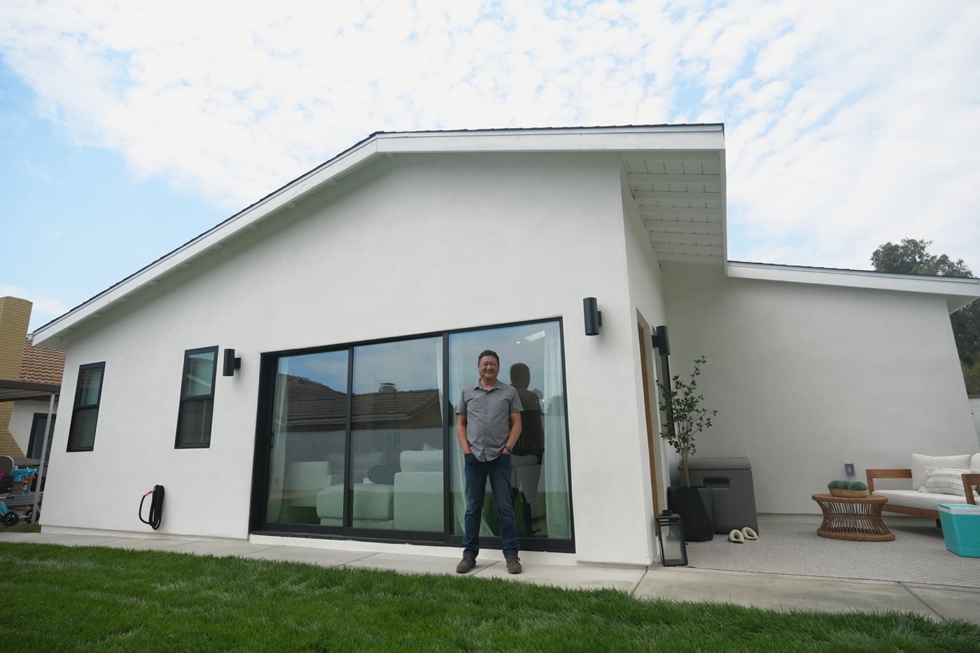John standing in front of his finished ADU in Yorba Linda